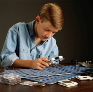 kid with magnifying glass